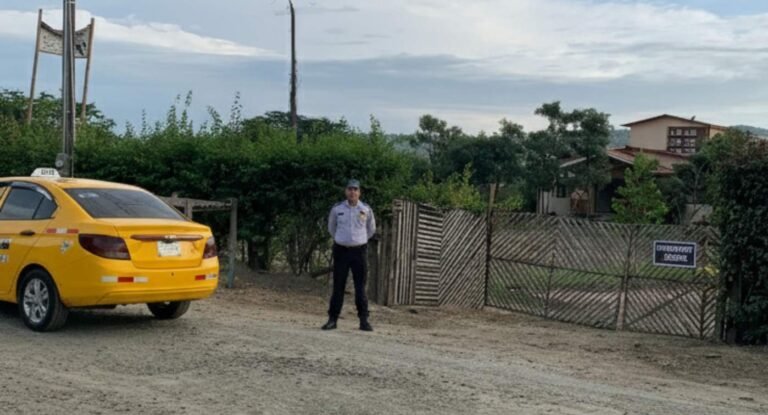 Security guard standing in front of home.