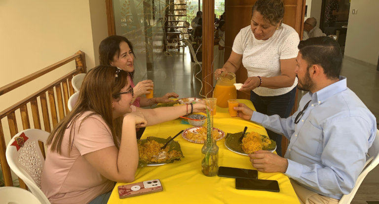 Group enjoying food and drinks together